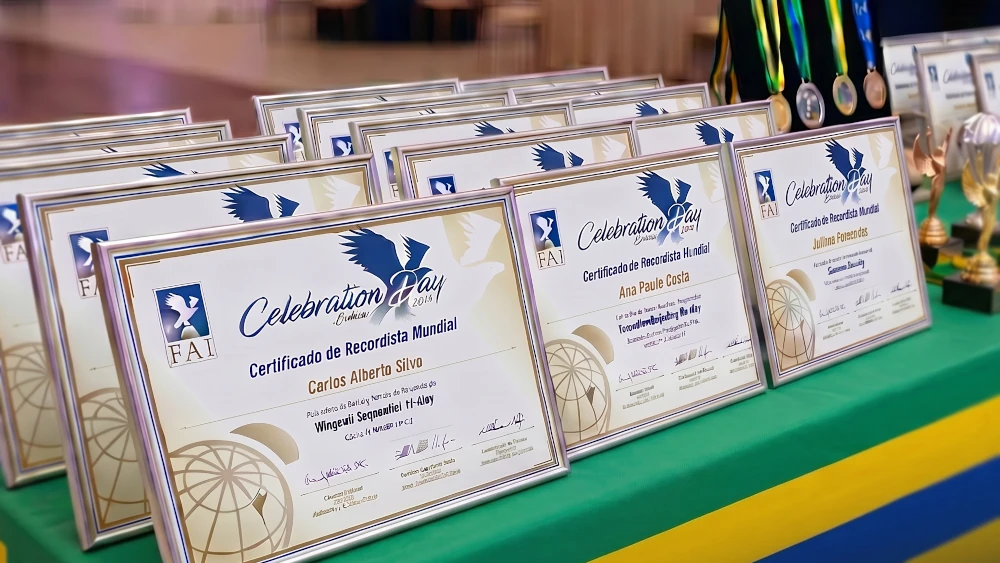 Mesa com os certificados do Celebration Day Boituva 2026